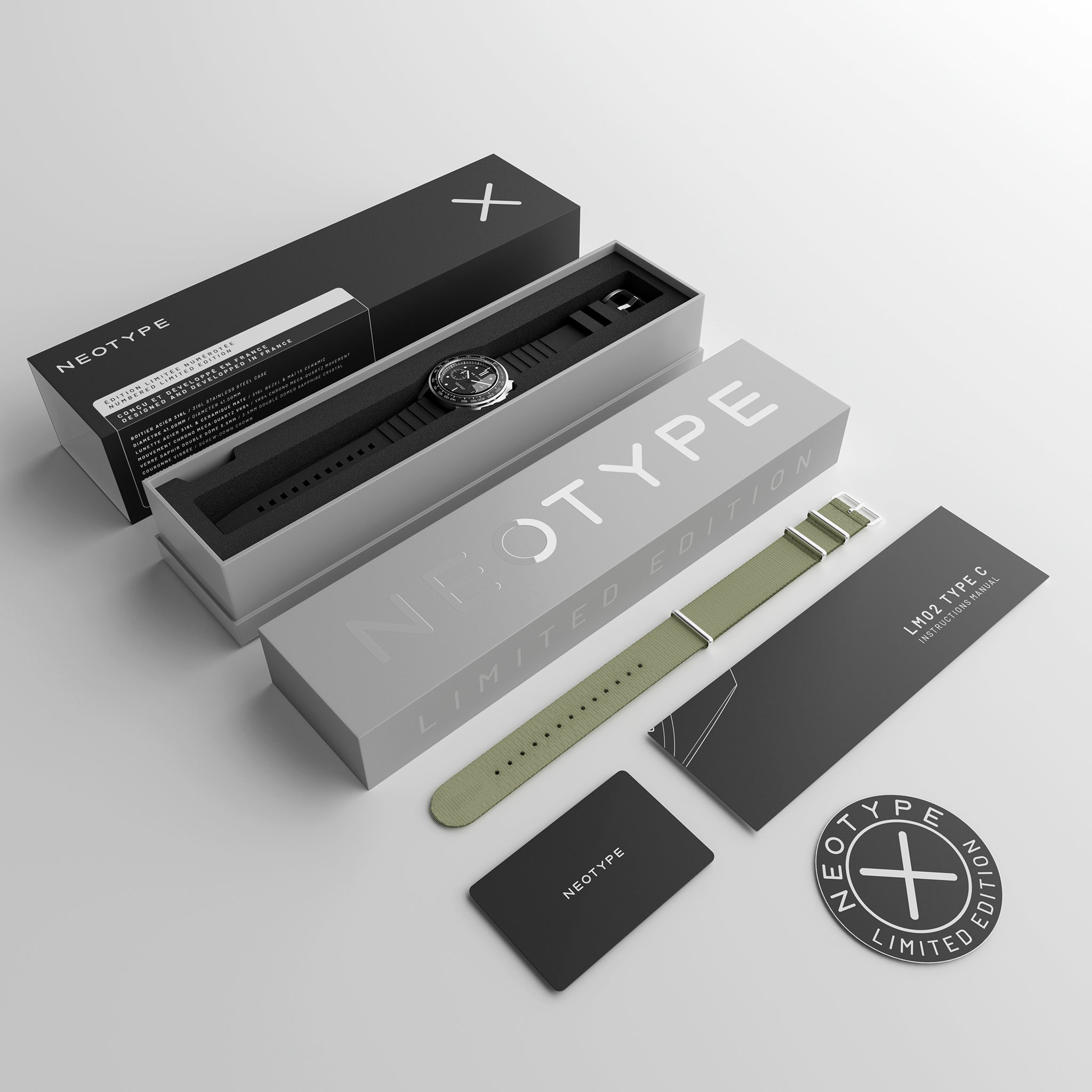 Montre chronographe Neotype Watches pour homme avec boîte de rangement et accessoires, disposés sur une surface blanche, montrant l’élégance de l’ensemble complet.